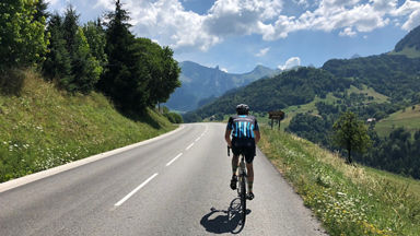 Person riding a bike down a road test
