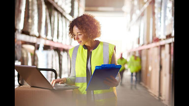 Person in warehouse doing inventory