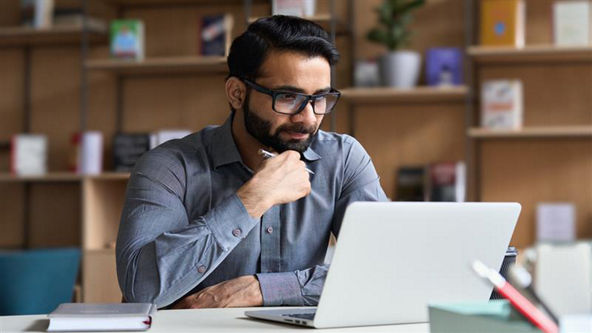male on computer