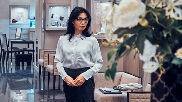 Female standing in jewelry store 