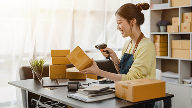 Female scanning a box