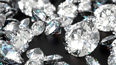 Cut diamonds on black background